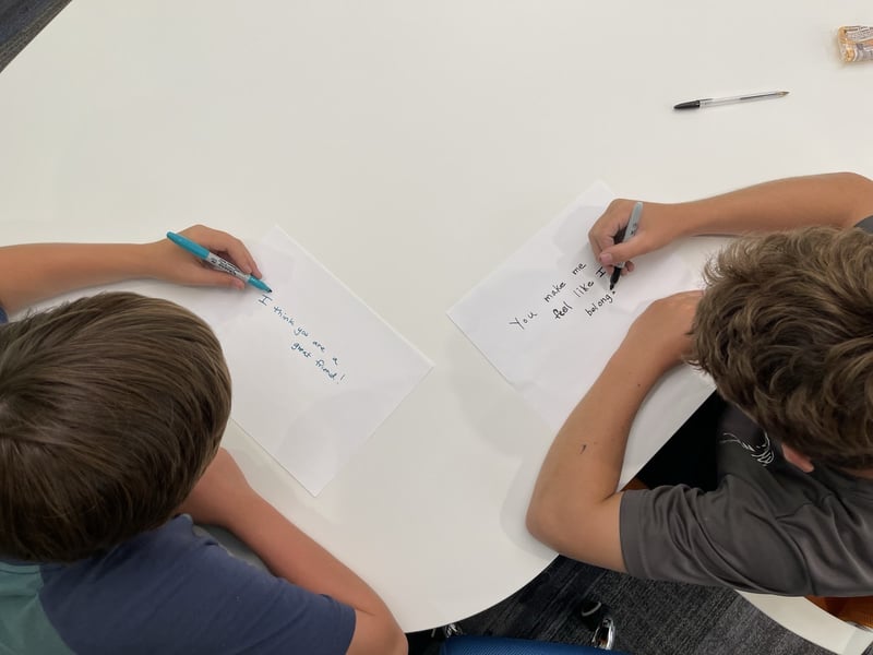 Boys writing SEL activitiy