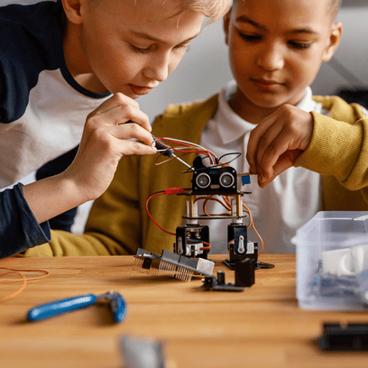 boys building a robot