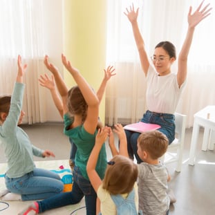 children stretching during a brain break