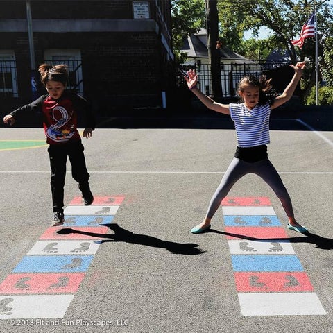 kids playing hopscotch