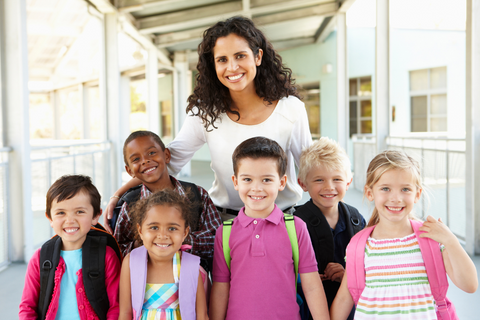 teacher and students smiling